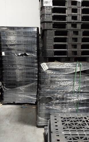 Condition photo showing As Is for plastic pallets/ conveyor